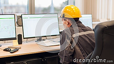 Maintenance engineer inspect relay protection system from control computer center Stock Photo