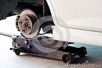 Maintenance by remove Wheel from car. Stock Photo