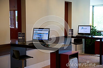 MAINZ, GERMANY - JUN 25th, 2017: Business Center with Computer Internet Printer Service, two PC in a luxury Hilton Hotel Editorial Stock Photo