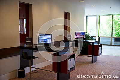 MAINZ, GERMANY - JUN 25th, 2017: Business Center with Computer Internet Printer Service, two PC in a luxury Hilton Hotel Editorial Stock Photo