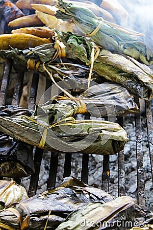 Maito wrapped in banana leaves prepared to parrila Stock Photo