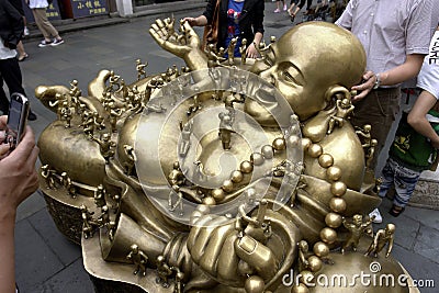Maitreya bronze statue Editorial Stock Photo