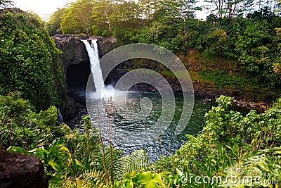 Majesitc Rainbow Falls waterfall in Hilo, Wailuku River State Park, Hawaii Stock Photo