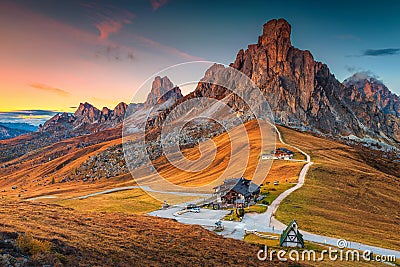 Majestic alpine pass with high peaks in background, Dolomites, Italy Stock Photo