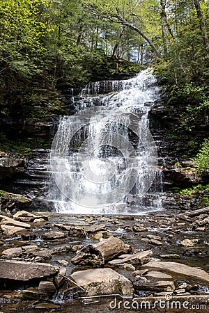 Majestic Cascade: A Vertical View of a Grand Pennsylvania Waterfall Stock Photo