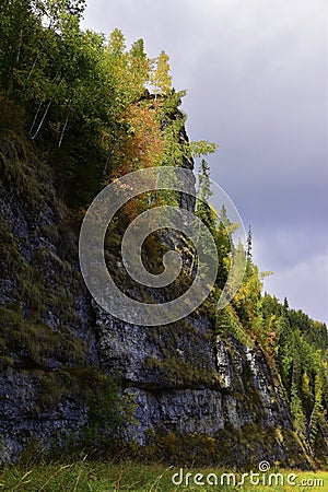 The majestic cliffs of Usva Pillars rise on the right bank of the Usva River in the Perm Territory Stock Photo