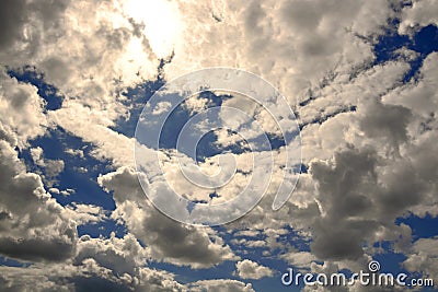 Majestic clouds blocking the sun on midday Stock Photo