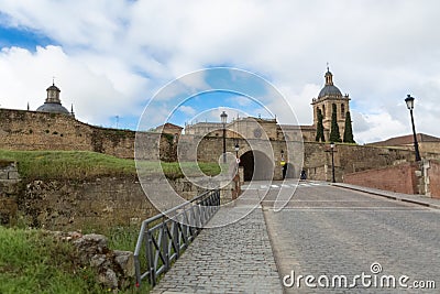 Majestic front view at the fortress gate and iconic spanish Romanesque architecture building at the Cuidad Rodrigo cathedral, Stock Photo