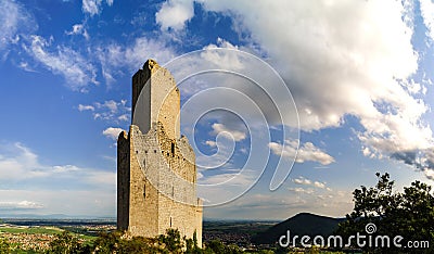 Majestic medieval castle ruins on the top of the hill Stock Photo