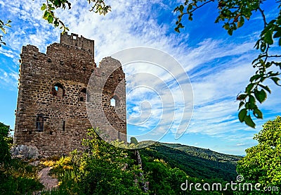 Majestic medieval castle ruins on the top of the hill Stock Photo