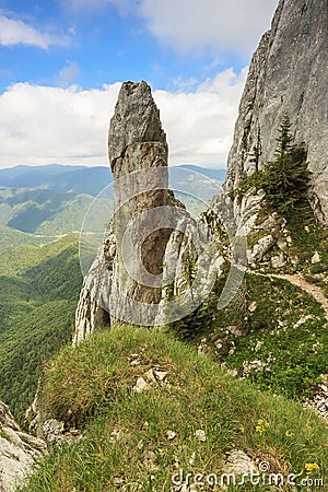 Majestic rock tower in mountains,Piatra Craiului mountains,Carpathians,Romania Stock Photo