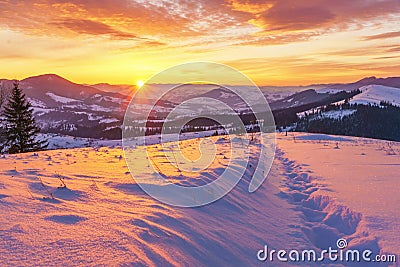 Sunrise in the winter hills mountains landscape. Stock Photo