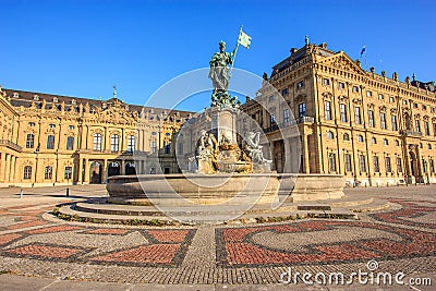 Majestic view of Frankonia fountain and facade of the Wurzburg Residence in Wurzburg, Bavaria, Germany , Europe Stock Photo