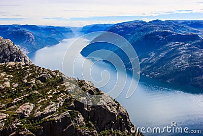 Majestic View from Preikestolen preacher pulpit rock, Lysefjord as background, Rogaland county, Norway, Europe Stock Photo