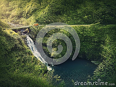 Makapipi Falls of Maui, the Road to Hana in Hawaii. Beautiful waterfall underneath the highway bridge. Wonderful cascade in the in Stock Photo