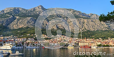 View of Makarska city center from the sea. Adriatic Sea coast, Dalmatia, Croatia Editorial Stock Photo