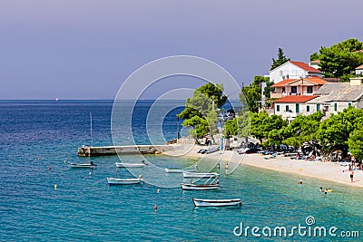 Picturesque Adriatic coast. The bay in Makarska resort with turquoise water Editorial Stock Photo