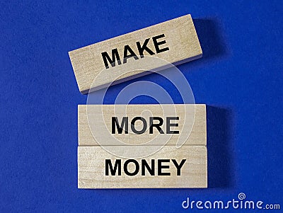 Make more money inscription words. Financial ambitions concept Stock Photo