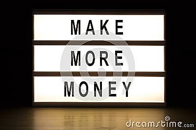 Make more money light box sign board Stock Photo