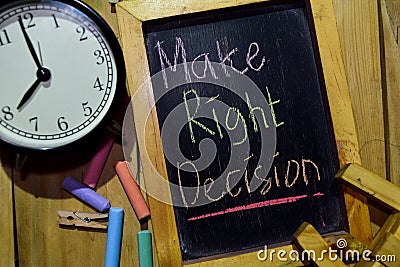 Make Right Decision on phrase colorful handwritten on chalkboard Stock Photo