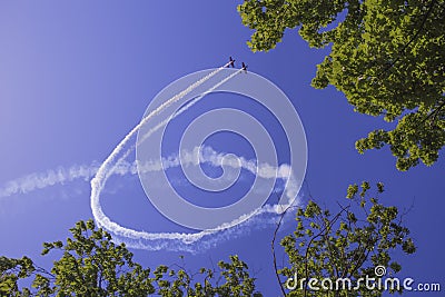 The An-2 make some trick in the sky. Stock Photo