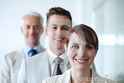 We make success a reality. Portrait of a group of confident-looking executives. Stock Photo