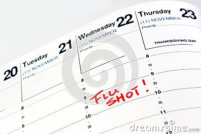 Flu shot reminder on calendar Stock Photo