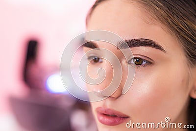 Make-up artist woman eyebrows close up. Professional makeup and cosmetology skin care Stock Photo