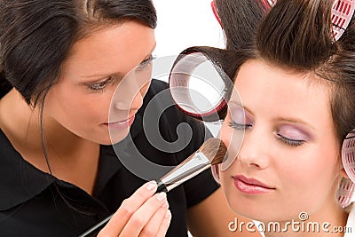 Make-up artist woman fashion model apply powder Stock Photo