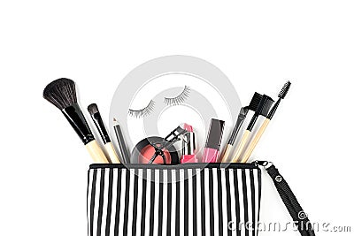 Make up bag with various cosmetics and brushes isolated Stock Photo