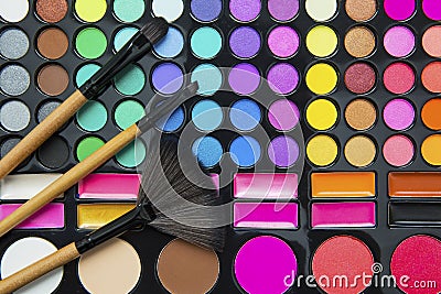 Make up brushes and eyeshadow palette Stock Photo