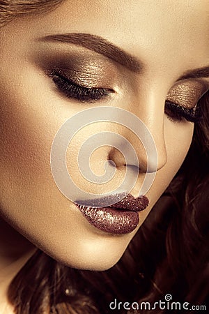 Make up. Glamour portrait of beautiful woman model with fresh makeup and romantic hairstyle. Stock Photo