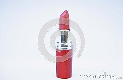 Daily make up. Lipstick for professional make up. Adding some shine to lips. Lip care concept. Lipstick on white Stock Photo