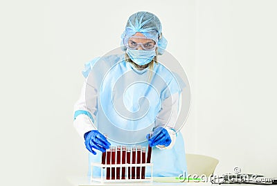 Make virus test. Take a blood test. Donate blood for analysis. coronavirus pandemic outbreak. woman doctor hold testing Stock Photo