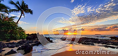 Makena Secret Beach at sunset in Maui, HI Stock Photo