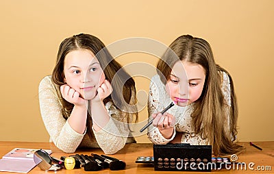 Makeup art. Explore cosmetics bag concept. Salon and beauty treatment. Just like playing with makeup. Children little Stock Photo