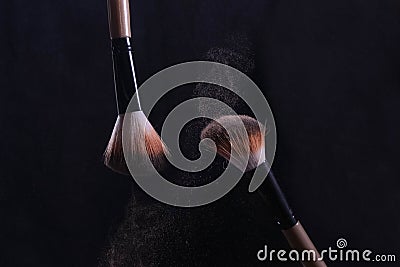 Makeup brushes powder splash Stock Photo