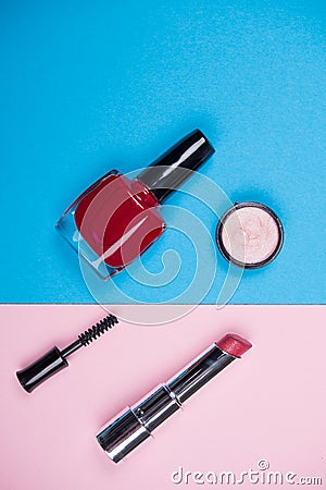 Makeup collection with lipstick, mascara, nail polish and brush Stock Photo