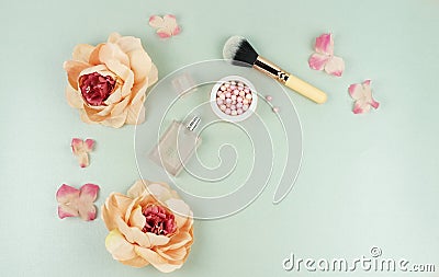 Makeup cosmetic accessories and flowers Stock Photo