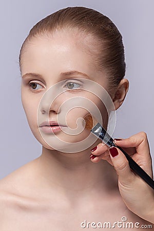 Makeup. Cosmetic. Applying Make-up Stock Photo