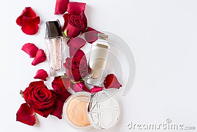 Makeup cosmetic with red flowers isolated on white background . copy space Stock Photo