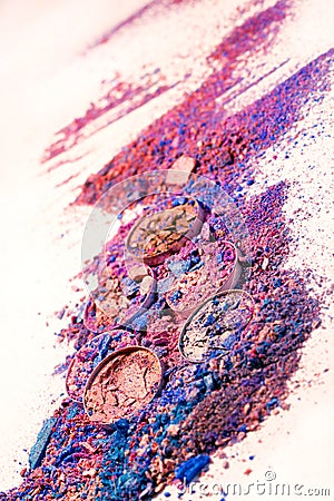 Makeup cosmetics. Eyeshadow crushed palette, colorful eye shadow powder on white background. Stock Photo