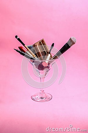 Makeup tools in Martini glass Stock Photo