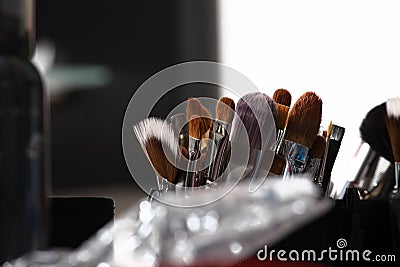 Makeup various colored brushes, closeup Stock Photo