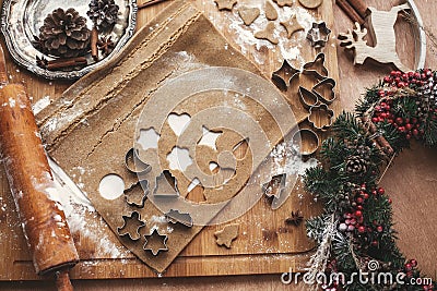 Making christmas gingerbread cookies flat lay. Dough with metal Stock Photo