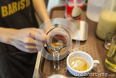 Making coffee in the cafe Editorial Stock Photo