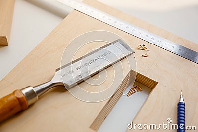 Making a component of wood furniture Stock Photo