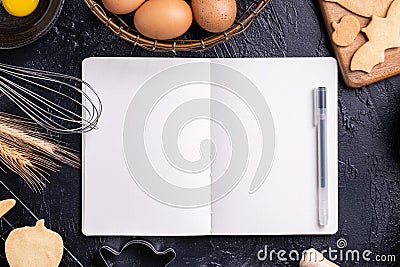 Making cookies cookbook recipe design concept, baking ingredients preparation layout with notebook, top view, flat lay, overhead, Stock Photo