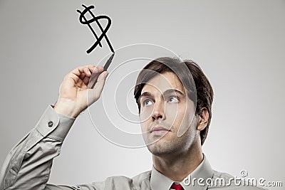 Making a dollar sigh. Stock Photo