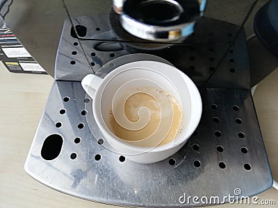 Making espresso coffee from a coffee machine Stock Photo